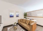 Thumbnail 7 of 37 - Pet-friendly home with a bright living room and ample natural light in a Miami Beach apartment.