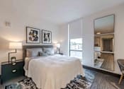 Thumbnail 18 of 37 - Well-lit and spacious bedroom in a pet-friendly Miami Beach apartment, featuring large windows that bring in natural light and create an airy, inviting atmosphere.