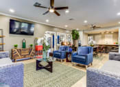 Thumbnail 14 of 17 - Pet-Friendly Apartments in Houston, TX – Artisan West – clubhouse with seating area