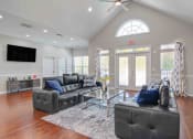 Thumbnail 12 of 23 - Ashford at Spring Lake apartments in Atlanta Georgia photo of clubhouse with plush seating