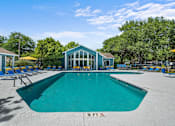 Thumbnail 4 of 29 - A swimming pool with a depth marker indicating 5 feet.