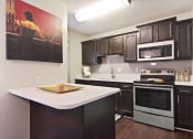 Thumbnail 1 of 15 - Audubon Briarcliff apartments in Atlanta Georgia photo of Kitchen