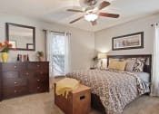 Thumbnail 5 of 15 - Audubon Briarcliff apartments in Atlanta Georgia photo of bedroom with ceiling fan