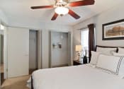 Thumbnail 6 of 15 - Audubon Briarcliff apartments in Atlanta Georgia photo of bedroom with ceiling fan