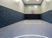 Thumbnail 32 of 46 - a basketball court in an empty gym