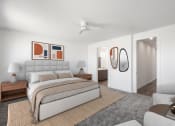 Thumbnail 10 of 41 - a bedroom with white walls and a bed and a couch