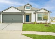 Thumbnail 15 of 46 - a white house with a blue door and a lawn