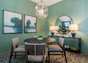 Thumbnail 17 of 18 - Elegant resident dining and gathering space at Blue Sky Landing apartments in College Park, GA with comfortable seating near Old National Highway, Camp Creek and Atlanta Airport.