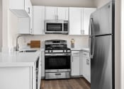 Thumbnail 46 of 66 - Kitchen in 2 Bedroom/2 Bath Floorplan at Element Apartments Las Vegas Nevada