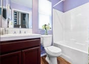 Thumbnail 7 of 14 - bathroom with wood-style flooring