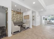 Thumbnail 24 of 35 - Apartments in Savannah, GA for Rent – The Palms at Chatham- clubhouse seating area