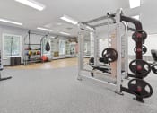 Thumbnail 19 of 35 - Savannah, GA Apartments – The Palms at Chatham– fitness center with strengthen equipment