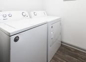 Thumbnail 12 of 35 - Apartments in Savannah, GA for Rent – The Palms at Chatham- our apartments have a laundry room with a washer and dryer