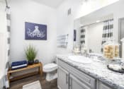 Thumbnail 11 of 35 - Pet-Friendly Apartments in Savannah, GA – The Palms at Chatham– a bathroom with a toilet sink and shower