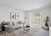 Thumbnail 5 of 15 - 2 & 3-Bedroom Apartments for Rent in Little Rock, AR – Capitol Hill – A living room with a grey couch, a grey chair, a black and white coffee table, and a large window with blinds.