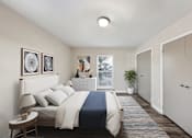 Thumbnail 9 of 25 - Apartments in Sandy Springs Georgia for Rent – Celebration at Sandy Springs - A bedroom with a bed, nightstand, and a plant.