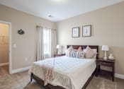 Thumbnail 9 of 31 - Apartments for Rent in Oak Ridge, TN 37830 – Centennial Village – a bedroom with a bed and two night stands