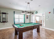 Thumbnail 24 of 31 - Apartments for Rent in Oak Ridge, TN 37830 – Centennial Village – a pool table in the middle of a room of our clubhouse