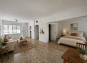 Thumbnail 5 of 8 - Open living space at RTW Rentals in Fort Lauderdale featuring spacious interiors, flexible furniture layouts, natural light, and tile flooring throughout.
