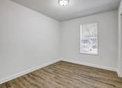 Thumbnail 7 of 21 - Chelsea Apartments in Gainesville Florida photo of bedroom with hardwood flooring