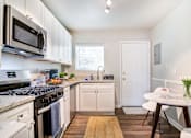 Thumbnail 1 of 21 - Collier Flats Apartments in Atlanta Ga photo of modern kitchen