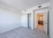 Thumbnail 13 of 20 - Countyline Apartments in Miami FL photo of  bedroom with hardwood flooring