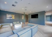 Thumbnail 18 of 20 - Countyline Apartments in Miami FL photo of clubhouse with plush seating and a tv