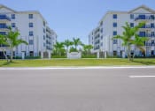 Thumbnail 20 of 20 - Countyline Apartments in Miami FL photo of community buildings and monument sign