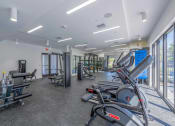 Thumbnail 16 of 20 - Countyline Apartments in Miami FL photo of fitness center with cardio equpiment