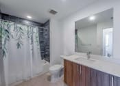 Thumbnail 7 of 20 - Countyline Apartments in Miami FL photo of bathroom with long vanity