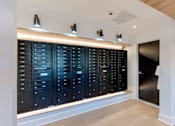 Thumbnail 12 of 22 - Resident mailroom with secure mailboxes at Creekline at Fairfield in Fairfield, Connecticut.