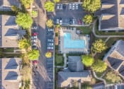 Thumbnail 25 of 29 - Twin Oaks Apartments in Hattiesburg Mississippi photo of arial view of our apartments with a swimming pool