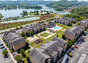 Thumbnail 30 of 31 - Apartments for Rent in Oak Ridge, TN 37830 – Centennial Village – an aerial view of our apartments near water