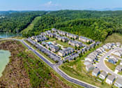 Thumbnail 29 of 31 - Pet-Friendly Apartments in Oak Ridge, TN – Centennial Village – an aerial view of a neighborhood