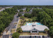 Thumbnail 35 of 35 - Savannah, GA Apartments – Canvas at Savannah– arial view of the community with the pool in the foreground