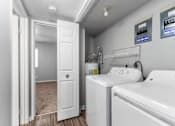 Thumbnail 10 of 12 - Apartments in Overland Park, KS for Rent - Treetop Lodge - Photo of Washer and Dryer