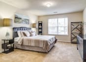 Thumbnail 5 of 23 - Ashford at Spring Lake apartments in Atlanta Georgia photo of bedroom with large window