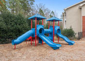 Thumbnail 15 of 23 - Ashford at Spring Lake apartments in Atlanta Georgia photo of playground