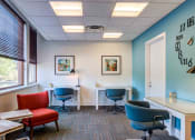 Thumbnail 28 of 38 - Business center with multiple work stations