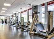 Thumbnail 16 of 38 - Strength training machines in fitness center