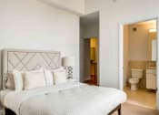 Thumbnail 7 of 38 - Model apartment bedroom and bathroom
