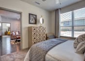 Thumbnail 9 of 25 - Stylish bedroom in Georgetown TX apartments near Wolf Ranch shopping and dining
