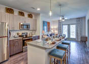 Thumbnail 1 of 25 - Luxury apartment kitchen in North Georgetown TX at Williamson at the Overlook near I-35