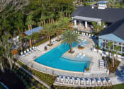 Thumbnail 28 of 39 - Luna at Lake Shadow apartments in Maitland Florida photo of aerial view of swimming pool with pool deck