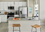 Thumbnail 1 of 39 - Luna at Lake Shadow apartments in Maitland Florida photo of modern kitchen