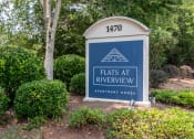 Thumbnail 24 of 24 - Flats at Riverview apartments in Duluth Georgia photo of a sign that says flats at riverview apartments