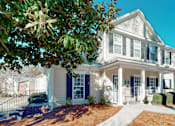 Thumbnail 15 of 16 - Exterior of the leasing office at Broad on the Green in Augusta, GA, in a pet-friendly apartment community.