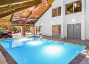 Thumbnail 2 of 14 - Stratford Wood Apartments and Townhomes in Minnetonka, MN Photo of the indoor swimming pool at our apartments