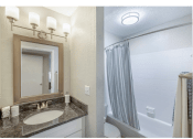Thumbnail 10 of 30 - Springdale Glen apartments in Clarkston Georgia photo of bathroom with custom lighting