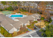 Thumbnail 25 of 30 - Springdale Glen apartments in Clarkston Georgia photo of aerial view of community building and pool